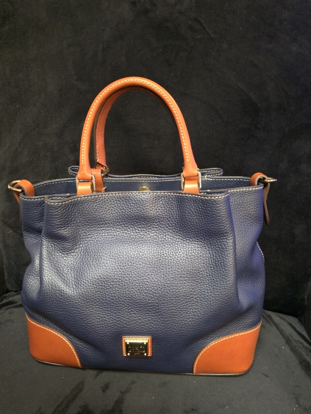 New without Tags. Dooney and Bourke Navy and Tan Leather Satchel Bag